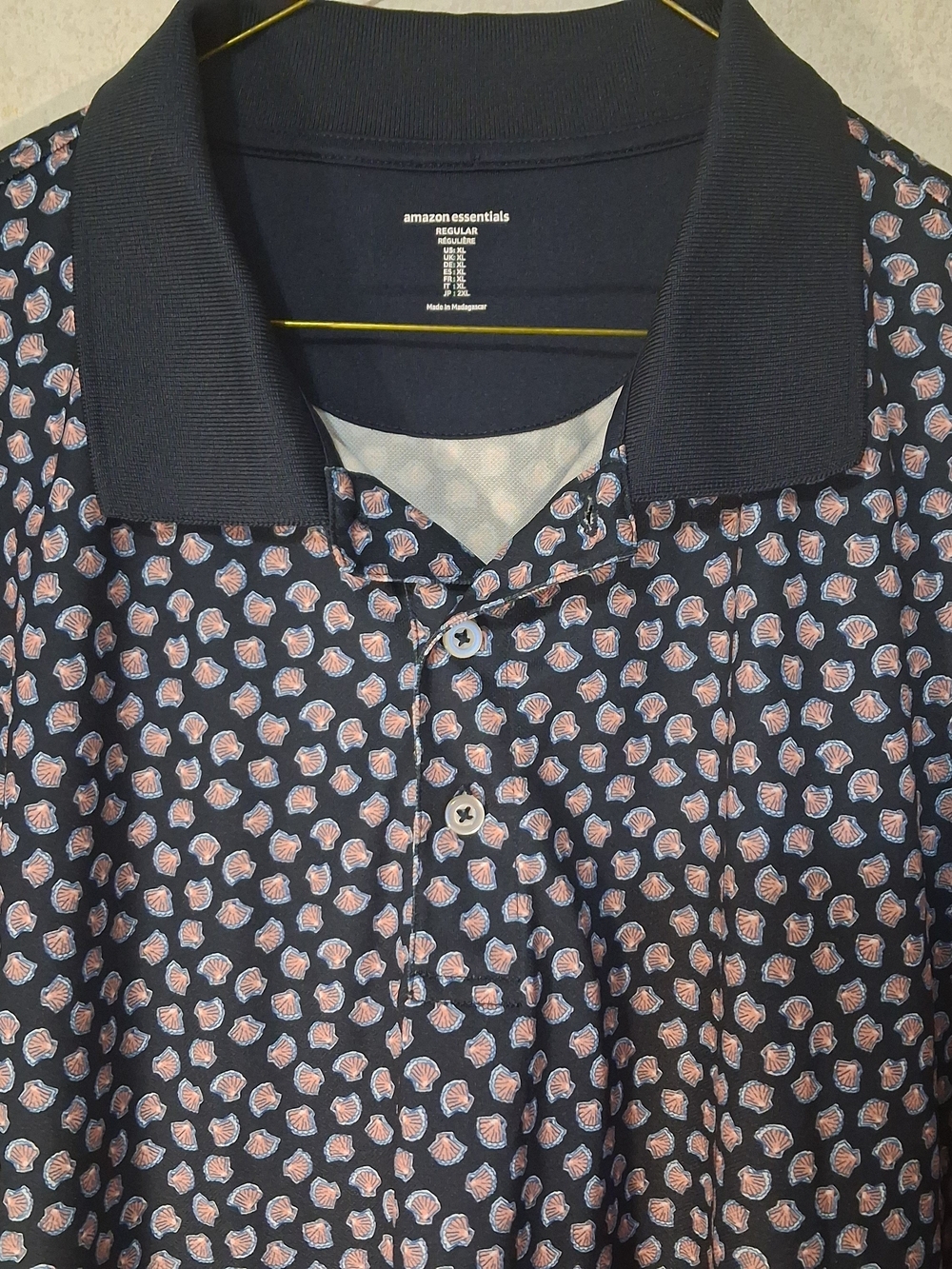 Amazon Essentials Men’s Navy Polo Shirt with Pink Shell Print. Size XL.